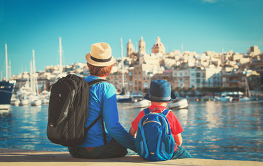 father and son looking at city of Valetta, Malta