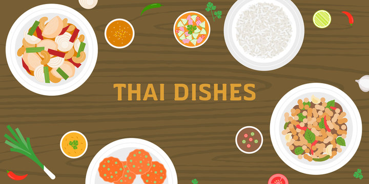 Thai dishes, mango with sticky rice, pad thai noodles, fried rice bake with pineapple on wooden background