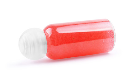 Pink strawberry shower gel container isolated on white background from top view