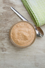 mustard hamburger sauce in glass bowl