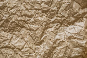 close up texture of the brown crumpled paper background