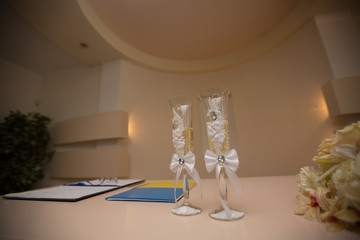 wedding glasses and wedding decor with flowerds