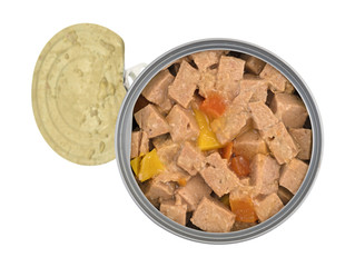 Opened can of lamb dog food with the lid to the side isolated on a white background.