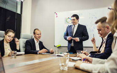 Business People Meeting Conference Discussion Corporate Concept,business team,business partners discussing documents and ideas,Business conference in a modern office,close up