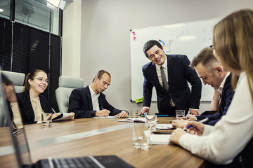 Business People Meeting Conference Discussion Corporate Concept,business team,business partners discussing documents and ideas,Business conference in a modern office,close up