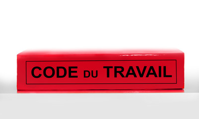French labor code book on white background, labor code law reform in France concept