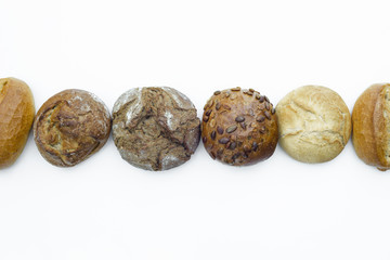 German traditional breads lined up on white isolated background