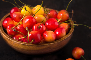 Cherry isolated on black background. Agriculture. Close-up. Top view