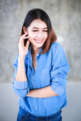 Asian woman casual outfits standing in jeans and blue denim shirt, women brown hair and short hair, beauty and fashion jeans concept - 162383339