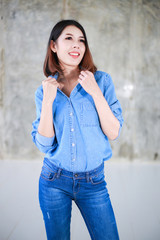 Asian woman casual outfits standing in jeans and blue denim shirt, women brown hair and short hair, beauty and fashion jeans concept - 162384141