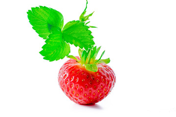 Strawberry with leaves isolated on white background.