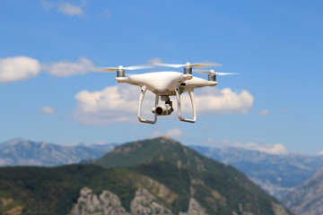 Fototapeta na wymiar flight of the drone over the mountain