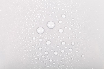 Drops of water on a color background. Selective focus. Shallow depth of field