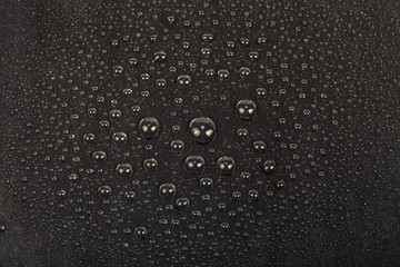 Drops of water on a color background. Selective focus. Shallow depth of field. Toned