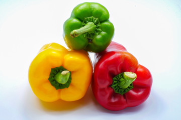 Red green yellow color bell pepper isolated on white background