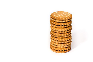 A stack of cicle biscuits puff sandwich cream isolated on white