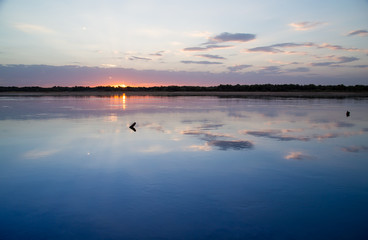 sunset on the lake as a backdrop