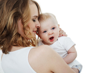 young beautiful mother with baby laughing isolated on white background