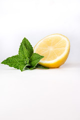 Lemon and mint isolated on white background