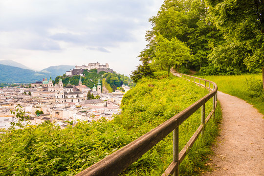 View of  Salzburg castle (Festung Hohensalzburg) and old town from a walking path along Monchsberg. Beautiful view of Salzburg, Austria.