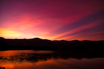 after sunset reflections at ang kaew lake chiang mai Thailand