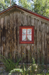 Old Log Cabin Window with Lace Curtains