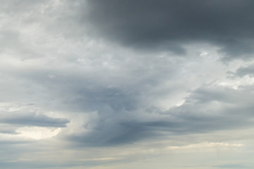 Menacing ,heavy clouds bear rain.