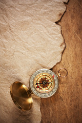 compass and a piece of old paper