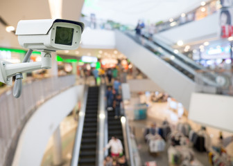 CCTV camera in shopping mall. security camera shopping mall on blurry background