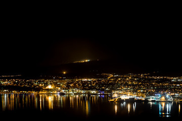 Obraz premium Panoramic view on Akureyri city at night in north iceland