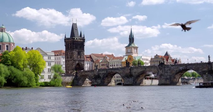  Zooming out of the Charles Bridge over the River Vltava in the Czech Republic, Europe.