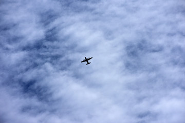 飛行機と雲（躍進、未来、可能性などのイメージ）