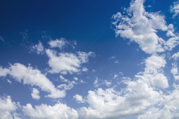 Beautiful blue sky with white clouds on a summer sunny day.