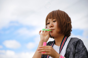 japanese young woman soap bubble