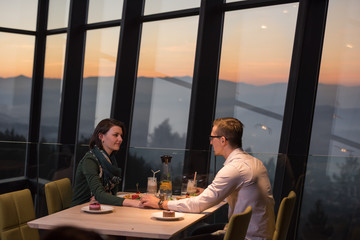 Couple on a romantic dinner at the restaurant