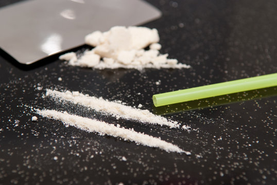 Drug abuse, cocaine chopped and in lines to be taken