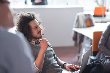 businessman working using a laptop in startup office
