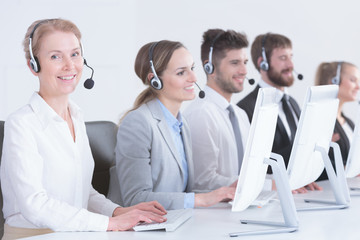 Consultants wearing headphones
