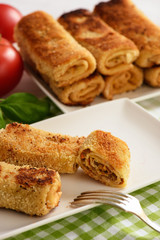 Croquettes polish style pancakes stuffed with beef.
