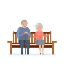 Lovely elderly couple sitting on a bench, they relax, communicate.