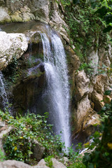 Waterfall in green subtropical mountains