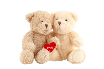 Light brown teddy bears with red heart isolated on white background. Valentine's Day.