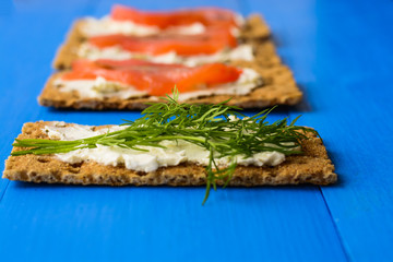 Healthy lunch, of crispbread with salmon and cream cheese