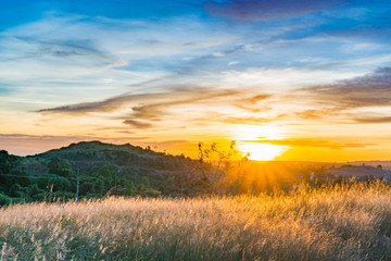 Mountain field during sunset