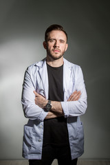 Student at a medical College in a white robe, a haughty look