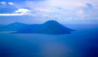Stoff pro Meter Aerial view to Tavurvur volcano at Rabaul, New Britain island, Papua New Guinea © homocosmicos
