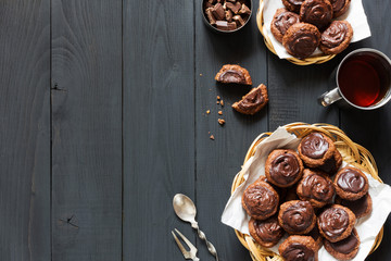 Homemade chocolate cookies on a dark table overhead