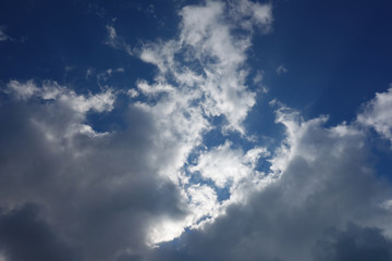Naklejka na ściany i meble Clouds on a blue background