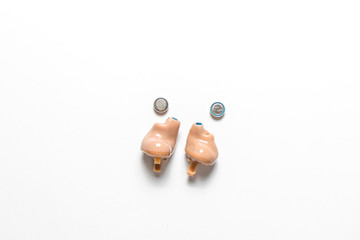  Ear aid or hearing aid isolated on white background