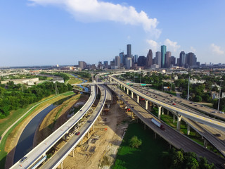 Aerial view downtown and interstate I45 highway with massive intersection, stack interchange, road...